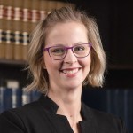 A person wearing glassesDescription automatically generated with medium confidence